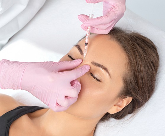 Woman receiving cosmetic BOTOX in Burke, VA