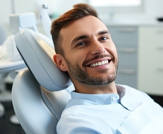 a dental patient smiling during a checkup