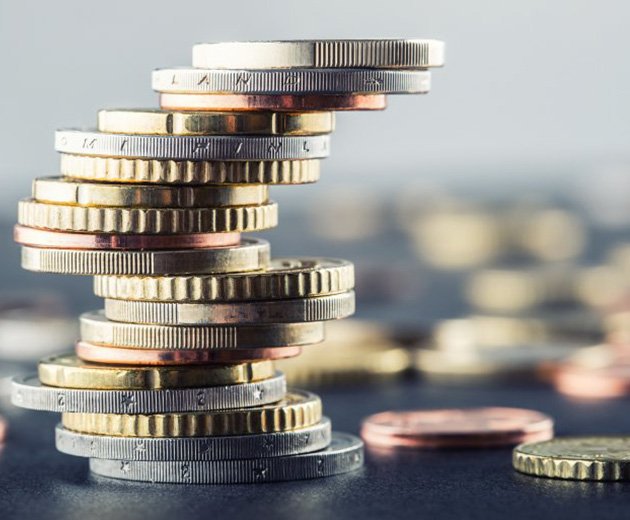 A precarious stack of coins